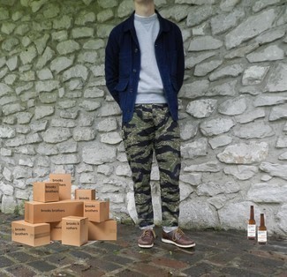 Olive Camouflage Chinos Outfits: A navy shirt jacket and olive camouflage chinos are the kind of a never-failing casual getup that you need when you have no time to spare. For something more on the dressier side to round off this look, complement this outfit with brown leather derby shoes.