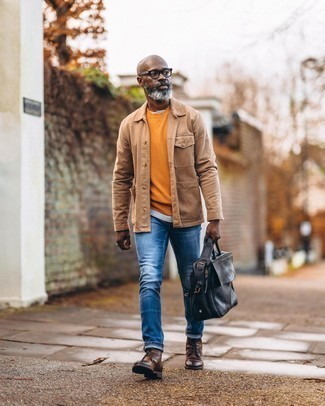 Tobacco Sweatshirt Outfits For Men: On days when comfort is paramount, marry a tobacco sweatshirt with blue jeans. You could follow a classier route on the shoe front by wearing dark brown leather casual boots.