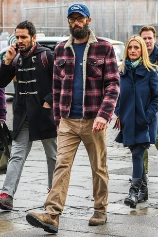 Navy and White Print Sweatshirt Outfits For Men: If you're after a laid-back and at the same time stylish outfit, opt for a navy and white print sweatshirt and khaki jeans. Tan suede chelsea boots are the most effective way to add a little kick to the ensemble.