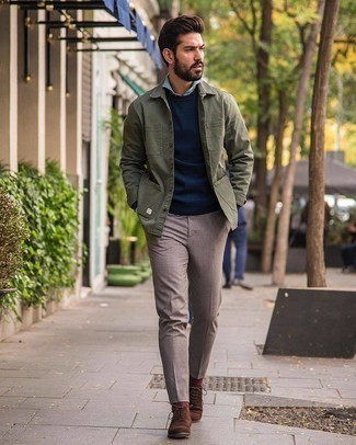 Navy Sweatshirt Outfits For Men: Try teaming a navy sweatshirt with khaki chinos for a standout look. Let your styling sensibilities really shine by finishing off this outfit with a pair of brown suede oxford shoes.