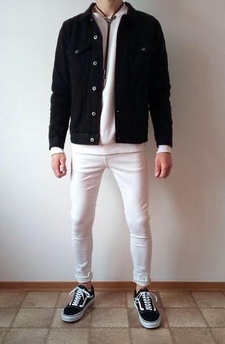 Black and White Canvas Low Top Sneakers Outfits For Men: A black shirt jacket and white skinny jeans worn together are a good match. Black and white canvas low top sneakers tie the look together.