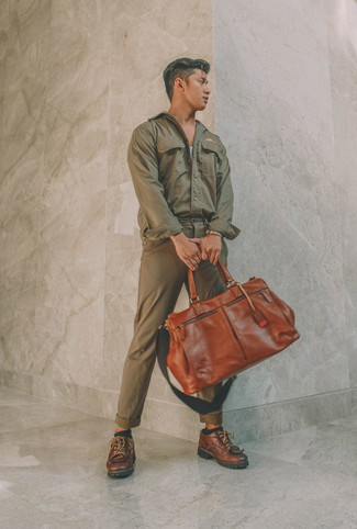 Duffle Bag Outfits For Men: An olive shirt jacket and a duffle bag make for the ultimate laid-back outfit for today's man. Feeling venturesome? Change up this outfit by finishing off with brown leather derby shoes.