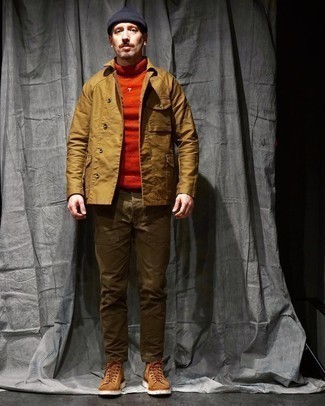 Orange Turtleneck Outfits For Men: This casual combo of an orange turtleneck and brown chinos is super easy to throw together without a second thought, helping you look awesome and ready for anything without spending too much time digging through your closet. Tan suede casual boots will add a more refined twist to this ensemble.