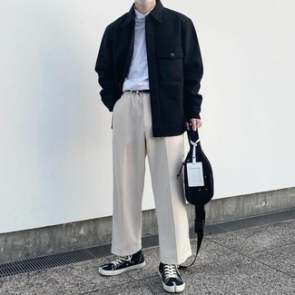 Fanny Pack Outfits For Men: A navy wool shirt jacket and a fanny pack are a great combo worth having in your daily routine. Black and white canvas high top sneakers are a savvy option to complement your ensemble.
