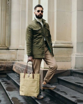 Tan Canvas Tote Bag Outfits For Men: If you feel more confident in comfortable clothes, you'll love this casual combination of an olive shirt jacket and a tan canvas tote bag. Tap into some Ryan Gosling stylishness and complement your look with grey suede low top sneakers.