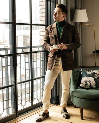 Dark Green Turtleneck Outfits For Men: To assemble a relaxed casual look with a twist, try pairing a dark green turtleneck with beige chinos. Dark brown leather double monks will immediately polish up even the simplest of ensembles.