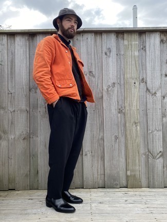 Orange Shirt Jacket Outfits For Men: An orange shirt jacket and navy chinos married together are a match made in heaven for gents who prefer polished combos. Want to go all out when it comes to shoes? Rock a pair of black leather chelsea boots.