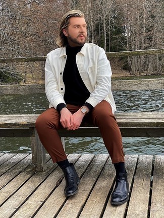 White Shirt Jacket Outfits For Men: Consider pairing a white shirt jacket with brown chinos if you wish to look dapper without putting in too much effort. Let your outfit coordination expertise truly shine by complementing your outfit with a pair of black leather chelsea boots.