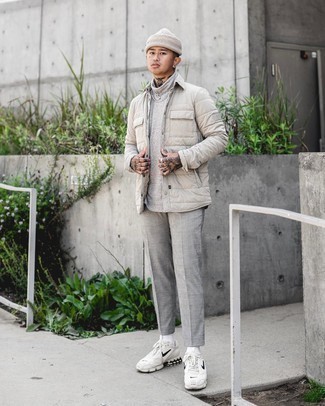 Tan Quilted Shirt Jacket Outfits For Men: For an outfit that's super simple but can be styled in many different ways, consider teaming a tan quilted shirt jacket with grey plaid chinos. A pair of white and black athletic shoes easily dials up the appeal of this look.