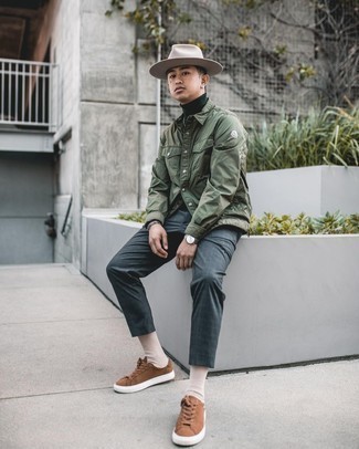 Brown Canvas Low Top Sneakers Outfits For Men: Dial down on the formality in this practical combination of an olive shirt jacket and charcoal check chinos. Add a more informal twist to this look by sporting a pair of brown canvas low top sneakers.