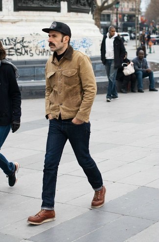 Beige Suede Shirt Jacket Outfits For Men: For a look that's super easy but can be manipulated in a ton of different ways, opt for a beige suede shirt jacket and navy jeans. Introduce a pair of tobacco leather casual boots to the equation for extra style points.
