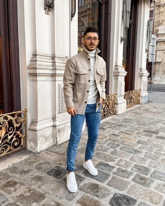 Navy Jeans with White Leather Low Top Sneakers Smart Casual Outfits For Men: This pairing of a beige wool shirt jacket and navy jeans is put together and yet it looks relaxed and ready for anything. Switch up this outfit by rounding off with a pair of white leather low top sneakers.