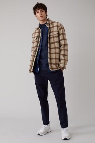 Beige Plaid Fleece Shirt Jacket Outfits For Men: Why not dress in a beige plaid fleece shirt jacket and navy chinos? As well as super comfortable, both pieces look nice paired together. Get a little creative when it comes to footwear and complement this look with white athletic shoes.