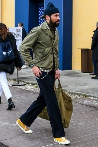 Mustard Low Top Sneakers Outfits For Men: This pairing of an olive shirt jacket and navy chinos looks neat and makes any guy look infinitely cooler. For something more on the off-duty end to complete your outfit, introduce mustard low top sneakers to the equation.