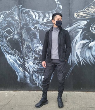 Grey Turtleneck Outfits For Men: This off-duty combination of a grey turtleneck and charcoal cargo pants is a life saver when you need to look cool in a flash. And if you wish to easily tone down your ensemble with one piece, add black athletic shoes to the equation.
