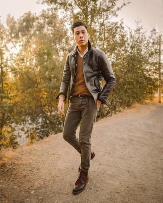 Black Leather Shirt Jacket Outfits For Men: A black leather shirt jacket and olive chinos make for the perfect base for an outfit. For something more on the smart end to complement your outfit, add dark brown suede brogue boots to the equation.