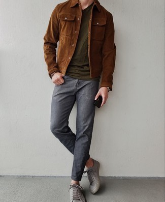 Brown Corduroy Shirt Jacket Outfits For Men: If it's comfort and functionality that you love in menswear, make a brown corduroy shirt jacket and charcoal jeans your outfit choice. Grey leather low top sneakers will contrast beautifully against the rest of the outfit.