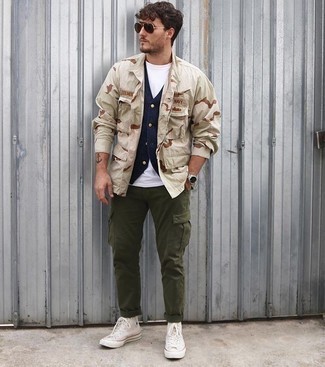 Beige Camouflage Shirt Jacket Outfits For Men: Extremely stylish, this casual combo of a beige camouflage shirt jacket and olive cargo pants brings amazing styling opportunities. On the fence about how to finish off? Introduce white canvas high top sneakers to the mix to shake things up.
