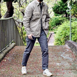Grey Shirt Jacket Outfits For Men: This casual combination of a grey shirt jacket and navy cargo pants is a real life saver when you need to look sharp in a flash. Play down the formality of your outfit by slipping into white athletic shoes.