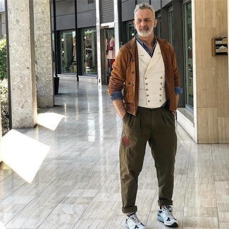White Waistcoat Outfits: We're loving the way this pairing of a white waistcoat and olive embroidered chinos immediately makes men look stylish and elegant. Let your styling prowess truly shine by completing your look with a pair of light blue athletic shoes.