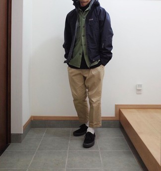 Navy Windbreaker Outfits For Men: This casual combo of a navy windbreaker and khaki chinos is a goofproof option when you need to look sharp but have no extra time to spare. This look is rounded off wonderfully with black canvas low top sneakers.