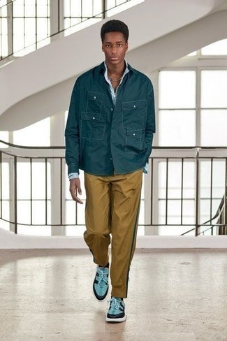 Tobacco Chinos Outfits: Channel your inner maverick in the menswear department and consider teaming a teal shirt jacket with tobacco chinos. Aquamarine athletic shoes are a simple way to inject a touch of stylish nonchalance into this getup.