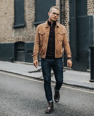 Dark Brown Zip Neck Sweater Outfits For Men: Effortlessly blurring the line between sharp and casual, this combo of a dark brown zip neck sweater and navy jeans is bound to become one of your favorites. Dark brown leather desert boots integrate smoothly within a multitude of getups.