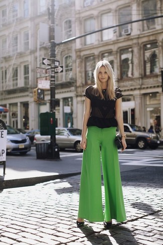 Green Wide Leg Pants Outfits: A black chiffon short sleeve blouse and green wide leg pants are the kind of a winning casual getup that you need when you have no time to put together an ensemble. If in doubt as to what to wear in the footwear department, complete this getup with black leather pumps.