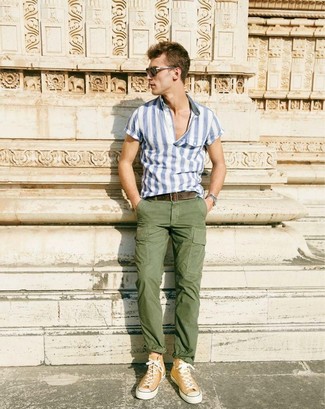 Tan High Top Sneakers Outfits For Men: A white and blue vertical striped short sleeve shirt and olive cargo pants make for the ultimate casual style for today's gentleman. Make tan high top sneakers your footwear choice to bring a hint of stylish casualness to your outfit.