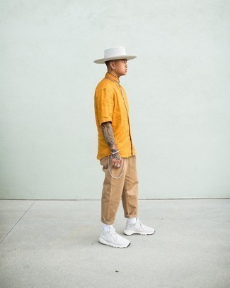 Men's Orange Short Sleeve Shirt, Khaki Chinos, White Athletic Shoes, White Wool Hat