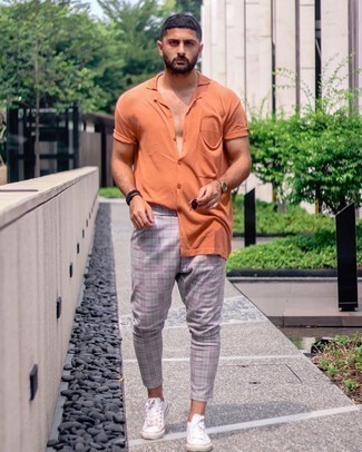 Gold Watch Outfits For Men: For an on-trend look without the need to sacrifice on comfort, we like this combination of an orange short sleeve shirt and a gold watch. Get a little creative in the shoe department and introduce white canvas low top sneakers to the mix.