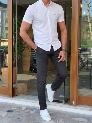 Grey Leather Watch Outfits For Men: Choose a white short sleeve shirt and a grey leather watch to achieve a casual and stylish outfit. Avoid looking too casual by rounding off with white canvas low top sneakers.