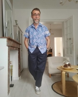 Men's Light Blue Floral Short Sleeve Shirt, Navy Chinos, Grey Canvas Low Top Sneakers, Clear Sunglasses