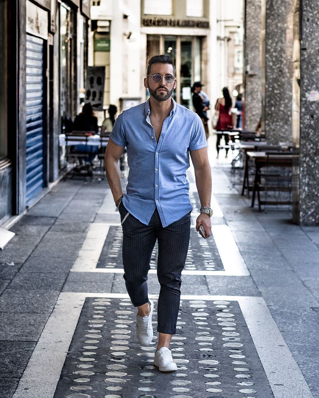 Men's Light Blue Short Sleeve Shirt, Navy Vertical Striped Chinos, White  Low Top Sneakers, Grey Sunglasses | Lookastic