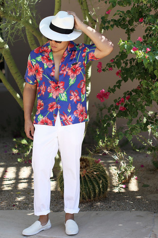 White Straw Hat Outfits For Men: For a casual street style getup, Team a blue floral short sleeve shirt with a white straw hat. And it's amazing what a pair of white canvas slip-on sneakers can do for the getup.