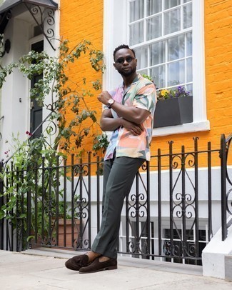 Tassel Loafers Outfits: Combining a multi colored print short sleeve shirt with dark green chinos is an on-point pick for a relaxed getup. Hesitant about how to round off your getup? Wear a pair of tassel loafers to step up the fashion factor.