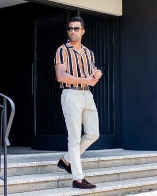 Dark Brown Suede Tassel Loafers Outfits: Such items as a multi colored vertical striped short sleeve shirt and white chinos are an easy way to infuse effortless cool into your daily off-duty wardrobe. Feeling inventive? Elevate your outfit with a pair of dark brown suede tassel loafers.