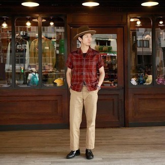 Brown Hat Outfits For Men: Try pairing a red plaid short sleeve shirt with a brown hat, if you want to dress for comfort without looking like a hobo to look stylish. For something more on the smart end to finish your ensemble, slip into black leather derby shoes.