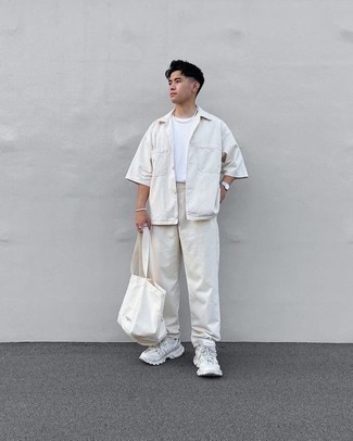 White Canvas Tote Bag Outfits For Men: If you're a fan of stay-in clothes which are stylish enough to wear out, consider this pairing of a white short sleeve shirt and a white canvas tote bag. Complement this getup with white athletic shoes for maximum style.