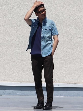 Black Canvas High Top Sneakers Outfits For Men: On-trend yet practical, this ensemble is comprised of a light blue denim short sleeve shirt and black chinos. To introduce a dash of stylish casualness to your outfit, add black canvas high top sneakers to the equation.