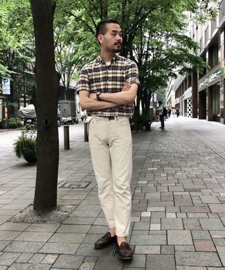 Beige Short Sleeve Shirt Outfits For Men: This casual combo of a beige short sleeve shirt and beige chinos is very easy to pull together without a second thought, helping you look awesome and ready for anything without spending too much time going through your closet. Make a bit more effort now and introduce dark brown leather loafers to the mix.