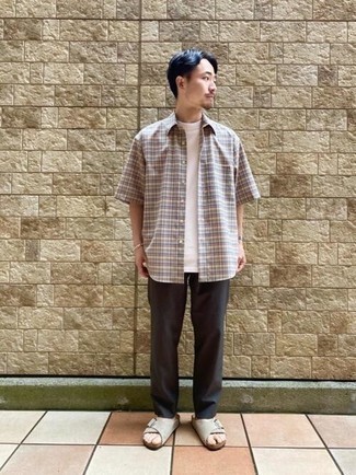 Tan Suede Sandals Outfits For Men: A multi colored plaid short sleeve shirt and dark brown chinos are a smart combination worth integrating into your day-to-day casual routine. And if you want to easily dial down this look with shoes, add tan suede sandals to this look.