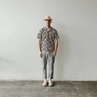 Grey Chinos Outfits: This off-duty pairing of a black print short sleeve shirt and grey chinos is a life saver when you need to look cool in a flash. Finishing off with white canvas high top sneakers is a fail-safe way to add a more relaxed twist to this ensemble.