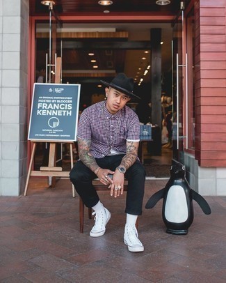Hat Outfits For Men: A dark purple check short sleeve shirt and a hat are great menswear staples that will integrate really well within your current casual fashion mix. A pair of white canvas high top sneakers easily amps up the style factor of this getup.