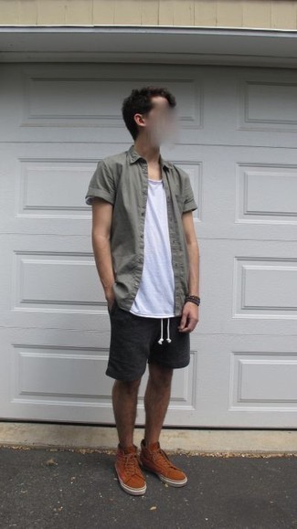 Brown High Top Sneakers Outfits For Men: Marrying an olive short sleeve shirt with black shorts is a great pick for a laid-back but on-trend look. Puzzled as to how to finish off? Throw in brown high top sneakers for a more relaxed take.