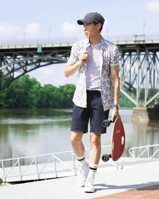 White and Red Canvas High Top Sneakers Outfits For Men: This is solid proof that a white and black print short sleeve shirt and navy shorts look awesome when worn together in a casual ensemble. Finishing with a pair of white and red canvas high top sneakers is a fail-safe way to infuse a laid-back feel into this outfit.