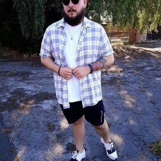White and Black Athletic Shoes Outfits For Men: Choose a light violet plaid short sleeve shirt and black sports shorts for equally stylish and easy-to-create outfit. White and black athletic shoes act as the glue that will bring your ensemble together.