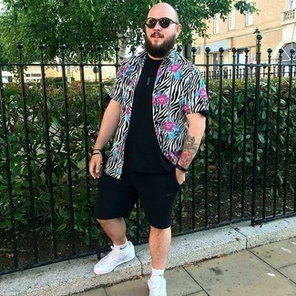 Black Sports Shorts Outfits For Men: If you're looking for a relaxed casual yet dapper look, wear a white floral short sleeve shirt with black sports shorts. If you want to instantly up the style ante of your ensemble with shoes, introduce a pair of white leather low top sneakers to the mix.