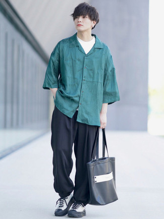 Teal Short Sleeve Shirt Outfits For Men: One of the most popular ways for a man to style out a teal short sleeve shirt is to wear it with black sweatpants for a casual outfit. Our favorite of a myriad of ways to complement this ensemble is with a pair of white and black canvas low top sneakers.