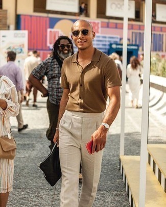 Black Canvas Zip Pouch Outfits For Men: This laid-back pairing of a tan short sleeve shirt and a black canvas zip pouch comes in handy when you need to look dapper but have zero time to spare.